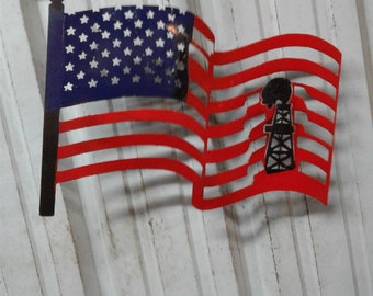American flag with oil derrick