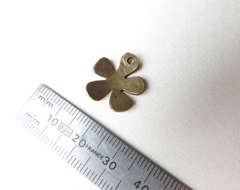 A flower pressed bronze