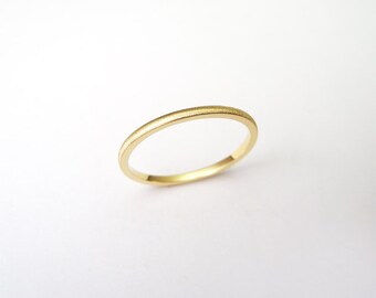Minimalistic stackable ring, yellow gold, matte finish