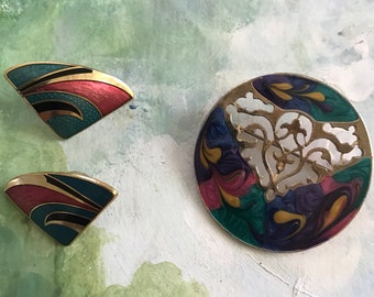 Enameled brooch andcomplimentary earrings.