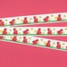 CHILDREN Jacquard Ribbon Trim, Poly, 5/8" Wide, Girl in Red Coat w/Yellow Basket Picking Flowers, Watching Butterflies, Lengths Vary