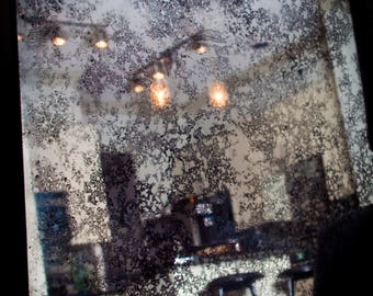 Antiqued distressed mirror