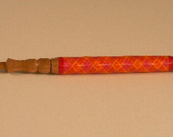 Lace bobbin with decorative thread wrapping