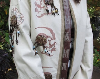 White leather Shaman Jacket with dreadlock skulls and spiked and studded cuff