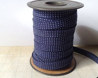 double fold bias tape 1/2" navy blue with white dots