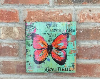 Original urban art mixing repurposed materials, inks, acrylics, and intention.