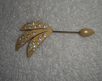 Vintage celluloid hat pin.