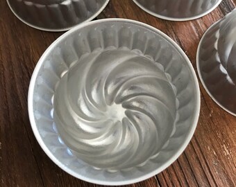 Set of six vintage aluminum Jell-O molds