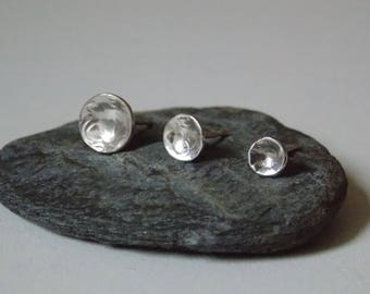 Round hammered studs made of silver