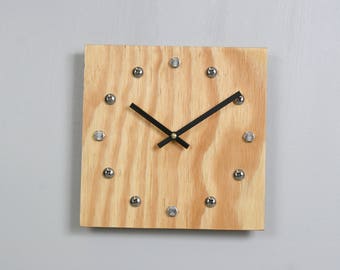 Plywood clock with stainless steel hour markers and Tung oil finish. USPS priority shipping to USA included