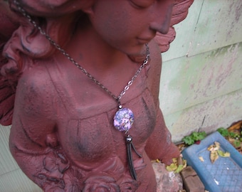 Lavender and gunmetal tassel pendant.