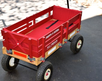 Tushions - Wagon cushions, wagon pads, with seatbelt(s), or with harness.