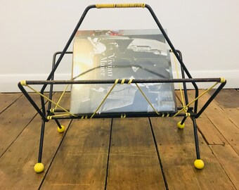 Mid century storage | Atomic vintage wire magazine rack yellow feet