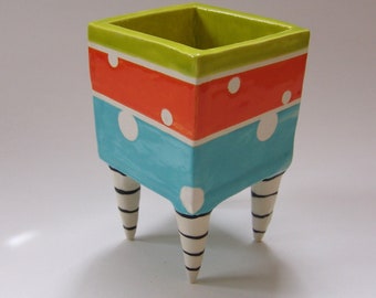 whimsical Pottery Dish :) Alice in Wonderland turquoise, orange & chartreuse polka dots with striped Beetlejuice legs