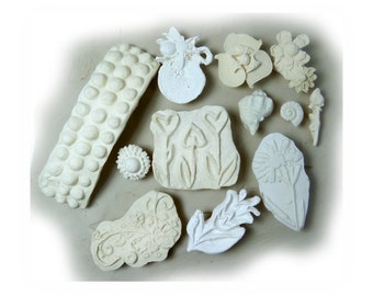 ceramic stamps - clay stamps -texture stamps -soap stamp -pottery stamps -One time grab bag of ( 12 ) bisque stamps - ( 288 )
