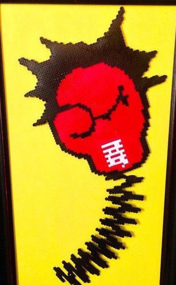 Perler bead boxing glove finished Unframed.