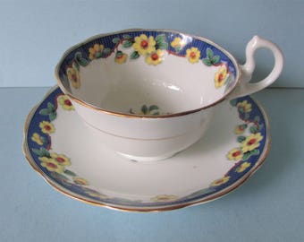 1930's Royal Albert Primrose Tea Cup, Saucer/ Blue band, vase, yellow primroses, Doris shape, footed tea cup, teacup, #6483