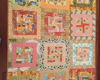Handmade quilt using Amy Butler fabric