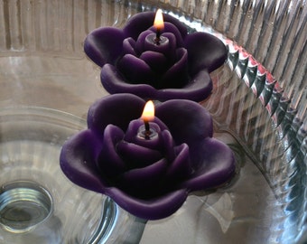 12 Purple floating rose wedding candles for table centerpiece and reception decor.