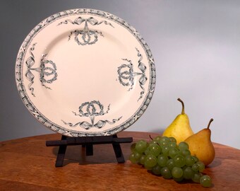 Beautiful and antique white plate with ribbons and wreaths, french ironstone from Salins les Bains. Service Montholon. French Transferware