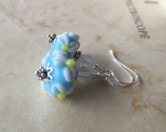 Blue floral lampwork earrings in sterling silver