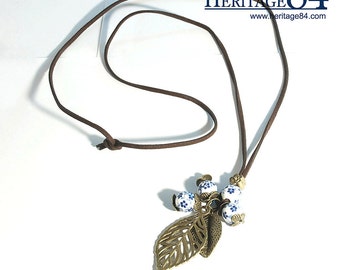Charm necklace with leather cord, fashion necklace, with leather cord, brown color, copper charm, charm necklace