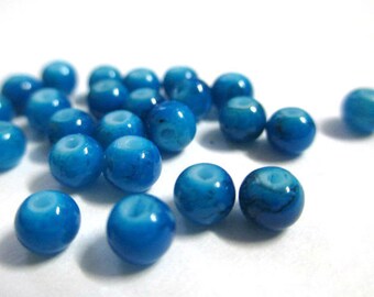 20 speckled Black 4mm blue beads
