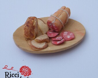 Tray with salami and crib and Dollhouse