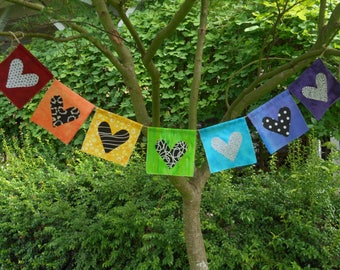Prayer flags fabric, handmade banner in rainbow and chakra colors, hearts in black and white