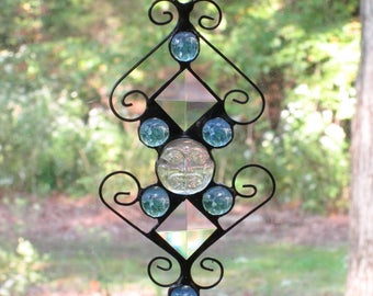 Stained Glass Suncatcher - Clear Iridescent Moonface, Blue Glass Nuggets, Clear Bevels, and Curly Cue Wire