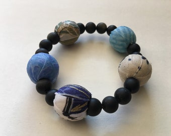 Blue fabric and obsidian beaded bracelet