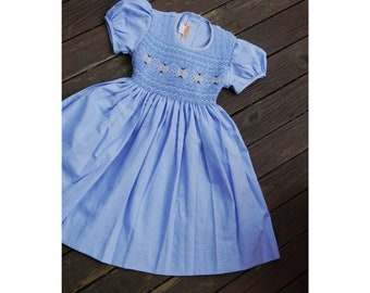 Dress SKY blue cotton for girl, without collar, puffed sleeves with embroidery made by hand, ribbons to tie in the back.