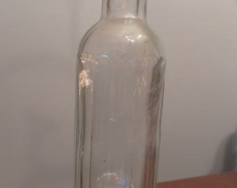 Small clear glass Carbona vintage bottle in great vintage condition