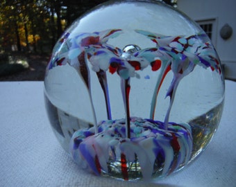 Paperweight with cranberry, blue, and white flowers