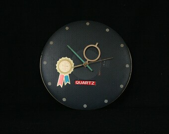 Wall clock, perforated metal, George Nelson & Mategot inspired, Taiwan, late 1980s, Quartz clock