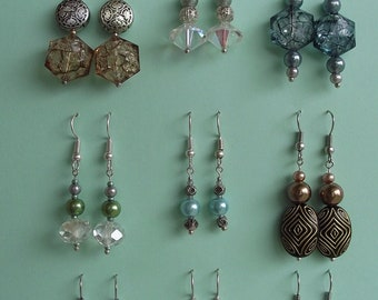Nine sets of Individually made bead drop ear rings