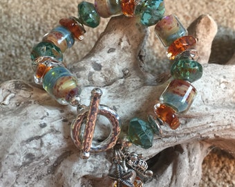 SAND AND SEA, artisan lampwork and sterling silver bracelet.