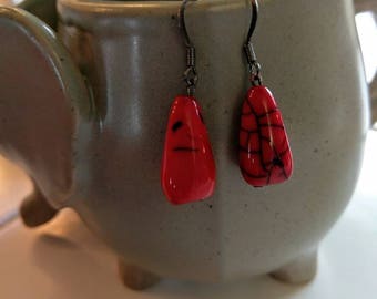 red statement dangles