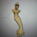 skeletal mermaid pendant