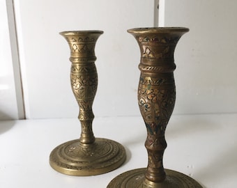 Pair of two painted brass candle stick holders