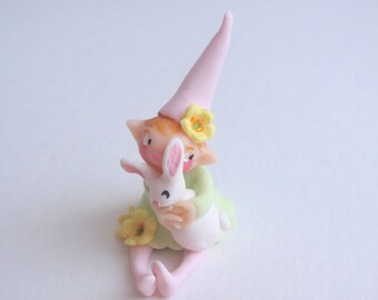 Little spring flower pixie with bunny rabbit
