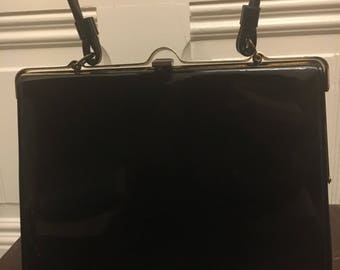 Black vintage patent leather handbag