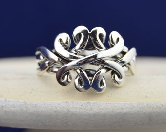 4 piece Sterling Silver Puzzle Ring in sizes 6, 7, 8, 9, 10
