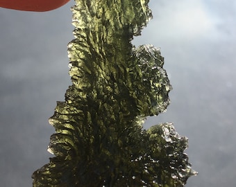 Moldavite from Czech Republic , 11,94 g , nice sculptured piece