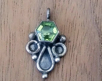 Peridot and sterling silver pendant