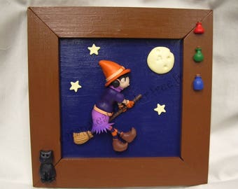 Painting little witch on her broom in the Moonlight