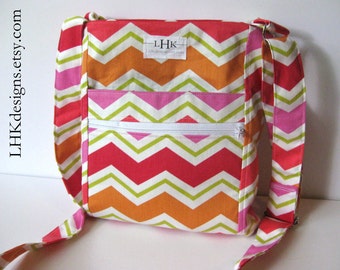 Chevron crossbody purse in pink, red, orange and lime green with adjustable strap