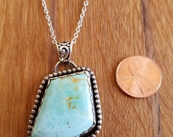 Blue Gem Mine turquoise pendant with 22" sterling silver chain.