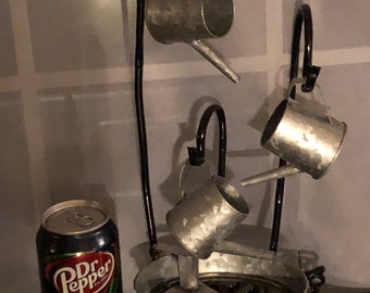 Miniature watering can fountain