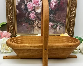 Collapsable folding hand made wooden basket.